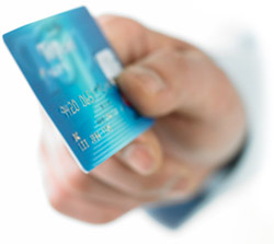 Hand holding a credit card